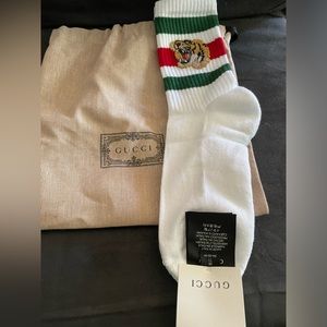 Authentic Gucci tall socks with Lion accent. Size (M). Unisex